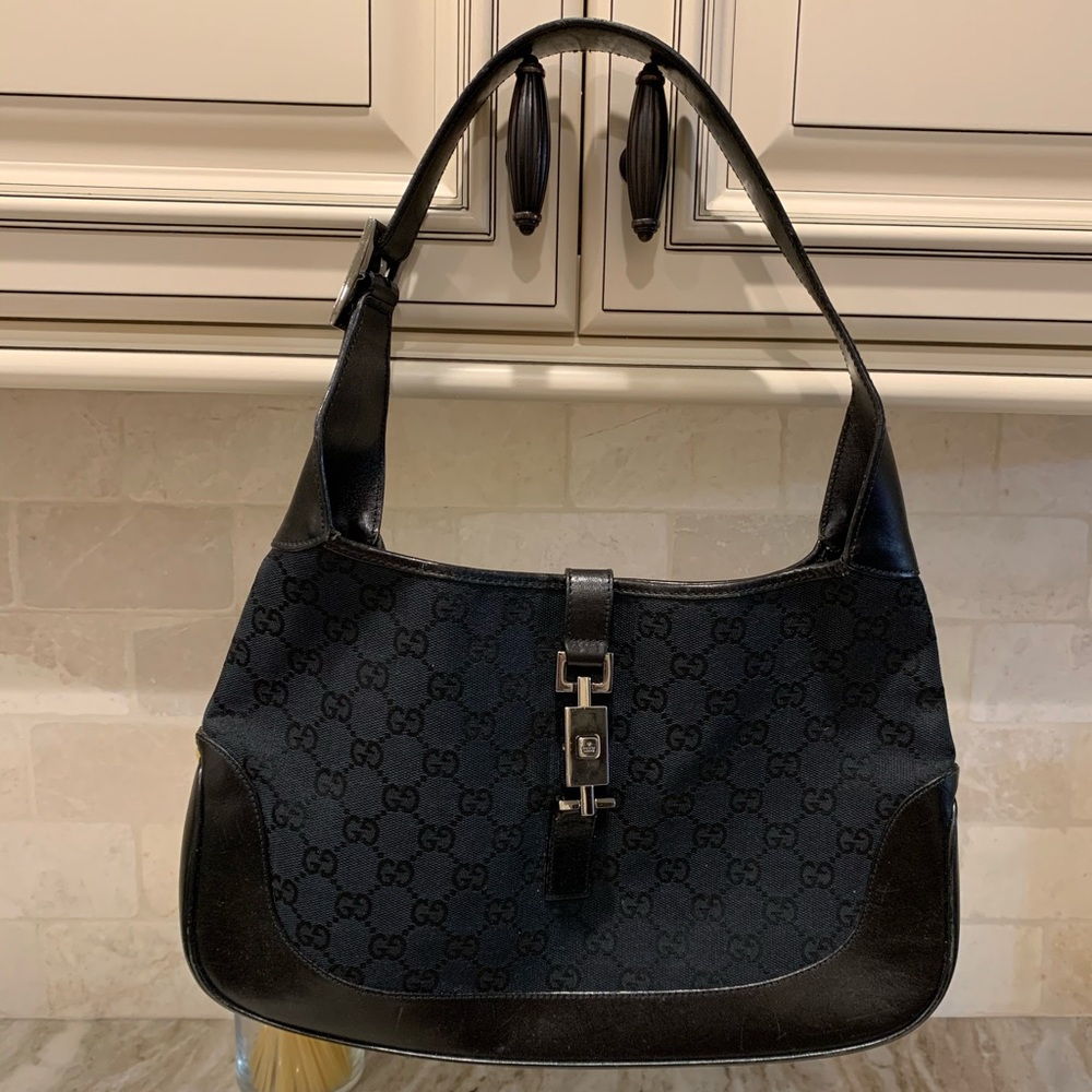 Gucci 
GG Canvas Jackie Shoulder Bag